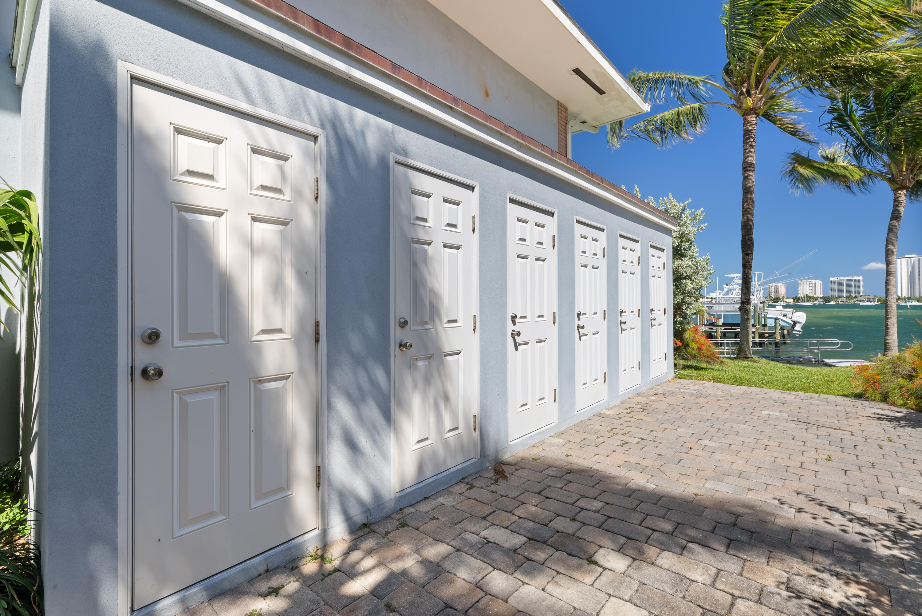 371 Wilma Circle, Unit 5 Riviera Beach, FL 33404 - Photo 39 of 43 a view of a bathroom with a tub and shower