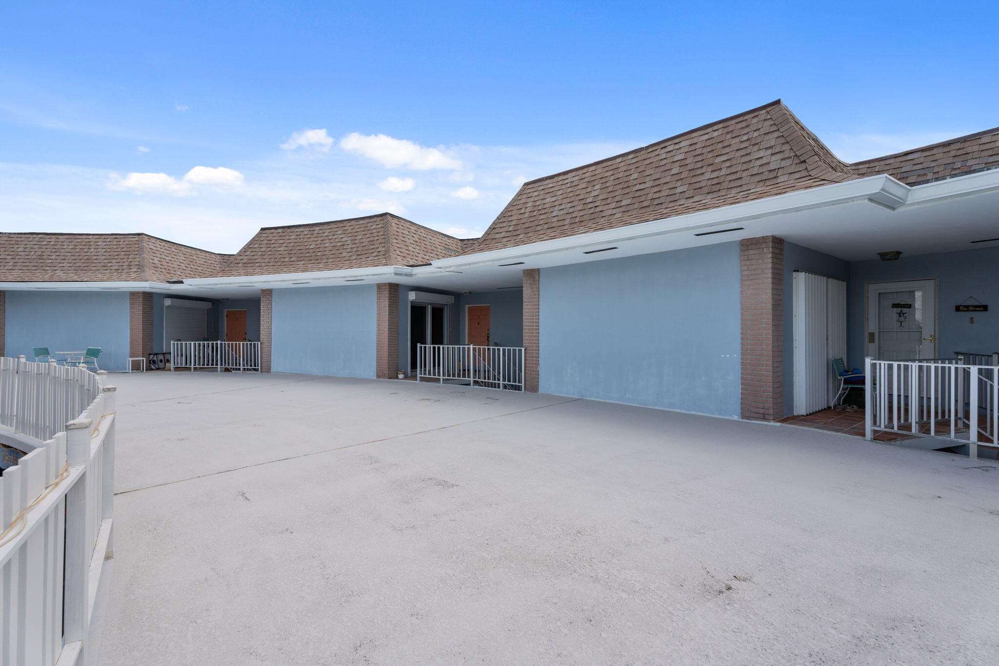 371 Wilma Circle, Unit 5 Riviera Beach, FL 33404 - Photo 43 of 43 a view of a house with a outdoor space