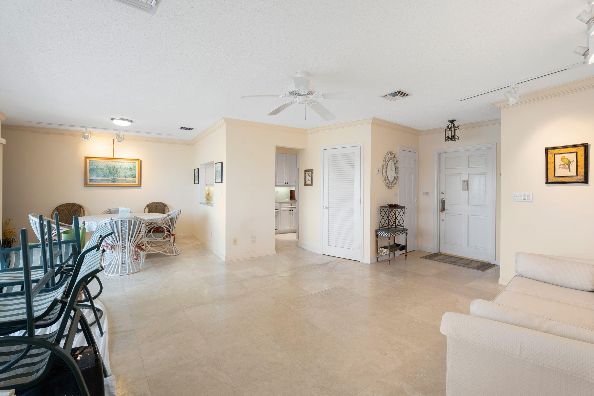 371 Wilma Circle, Unit 5 Riviera Beach, FL 33404 - Photo 6 of 43 a view of a livingroom with furniture and a window