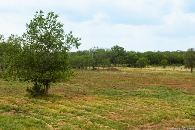 a view of a lake with houses in outdoor space