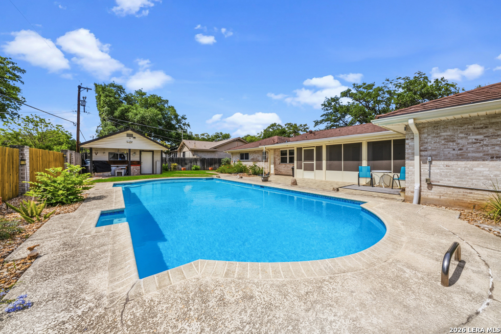 6022 Winding Ridge Drive Windcrest, TX 78239 - Photo 30 of 31 swimming pool with outdoor seating