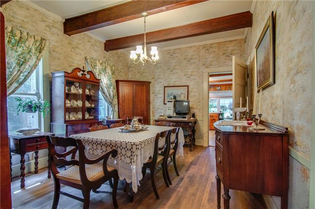 3381 Blazer Road Franklin, TN 37064 - Photo 12 of 20 a view of a dining room with furniture and chandelier