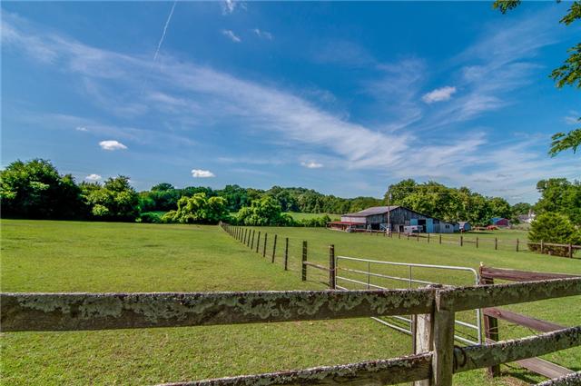 3381 Blazer Road Franklin, TN 37064 - Photo 17 of 20 a view of a golf course with a lake view