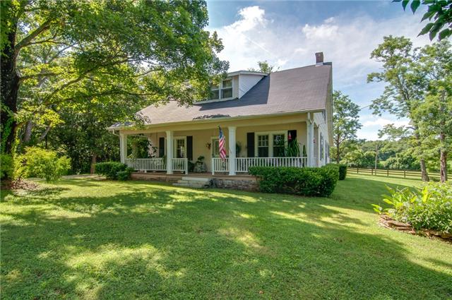 3381 Blazer Road Franklin, TN 37064 - Photo 2 of 20 a front view of a house with a garden