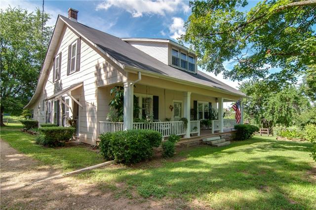 3381 Blazer Road Franklin, TN 37064 - Photo 3 of 20 a front view of a house with garden and porch