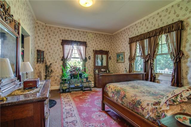 3381 Blazer Road Franklin, TN 37064 - Photo 7 of 20 a bedroom with a large bed and a window