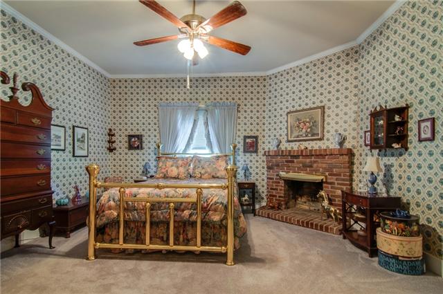 3381 Blazer Road Franklin, TN 37064 - Photo 8 of 20 a bedroom with a bed and a fireplace