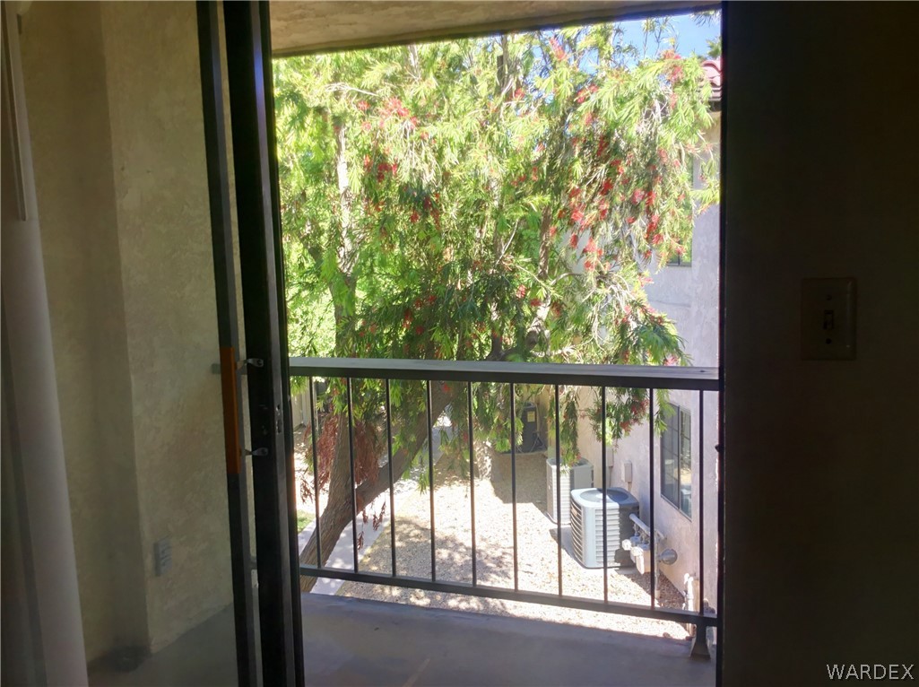 1190 Ramar Road Bullhead City, AZ 86442 - Photo 12 of 32 a view of a glass door