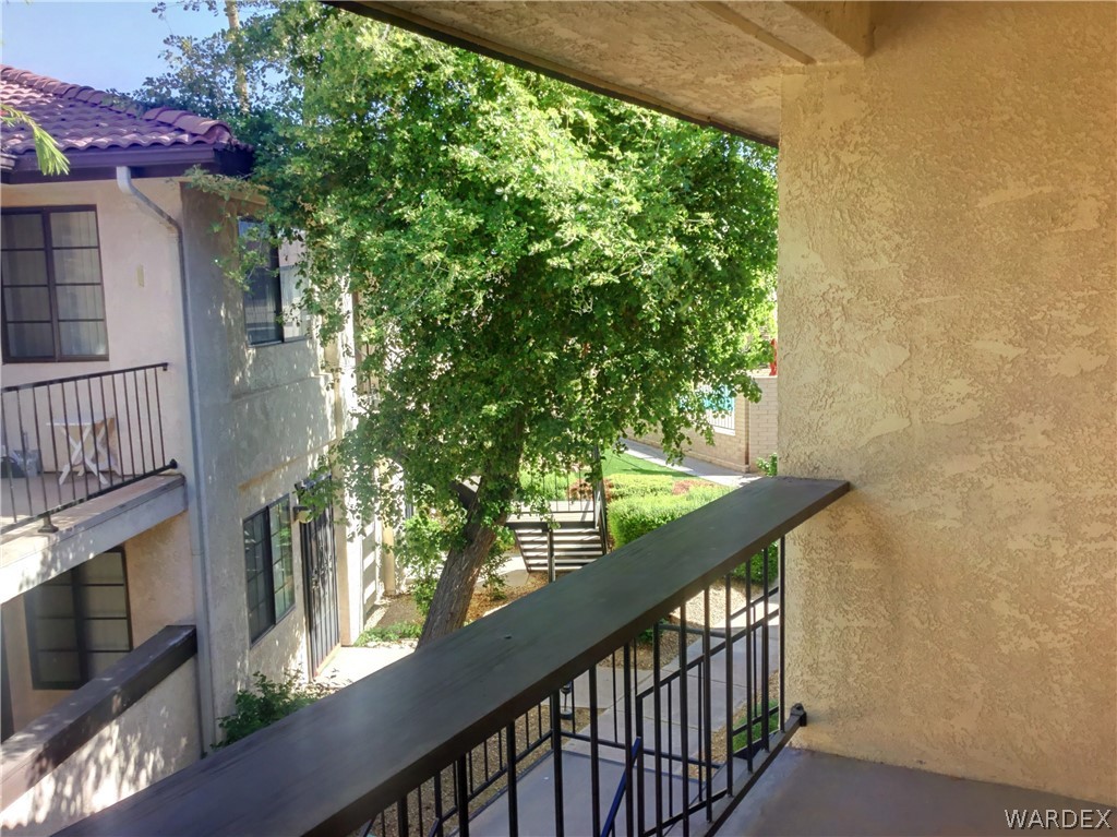 1190 Ramar Road Bullhead City, AZ 86442 - Photo 13 of 32 a view of balcony with wooden floor