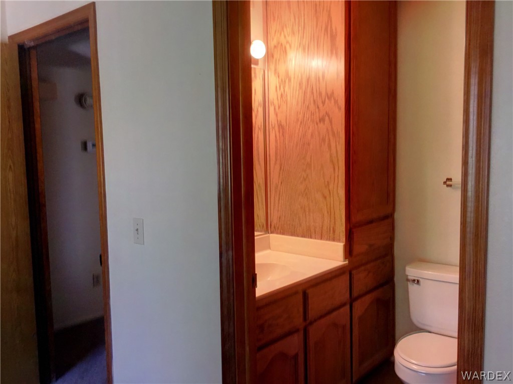1190 Ramar Road Bullhead City, AZ 86442 - Photo 21 of 32 a bathroom with a toilet and a shower