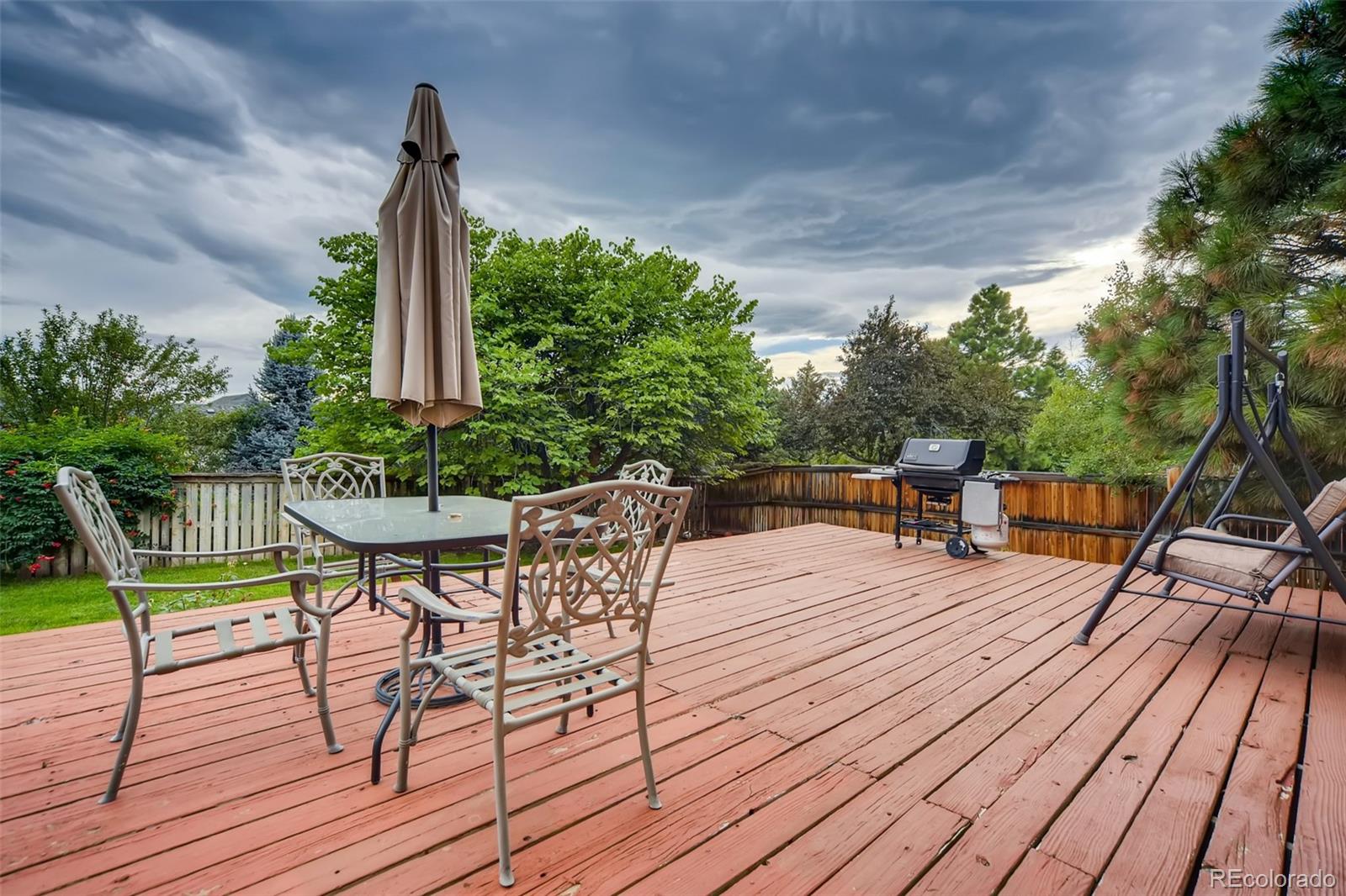 642 Northridge Road Highlands Ranch, CO 80126 - Photo 27 of 31 a view of deck with patio