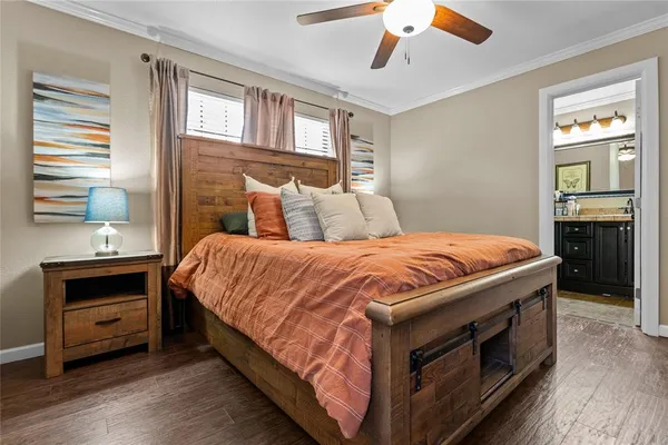 a bedroom with a bed and a dresser