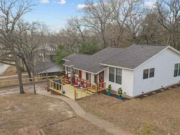 a house with trees in front of it