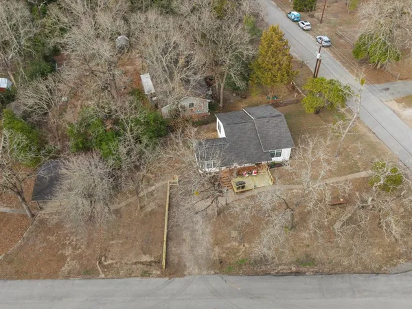 an aerial view of residential house with outdoor space