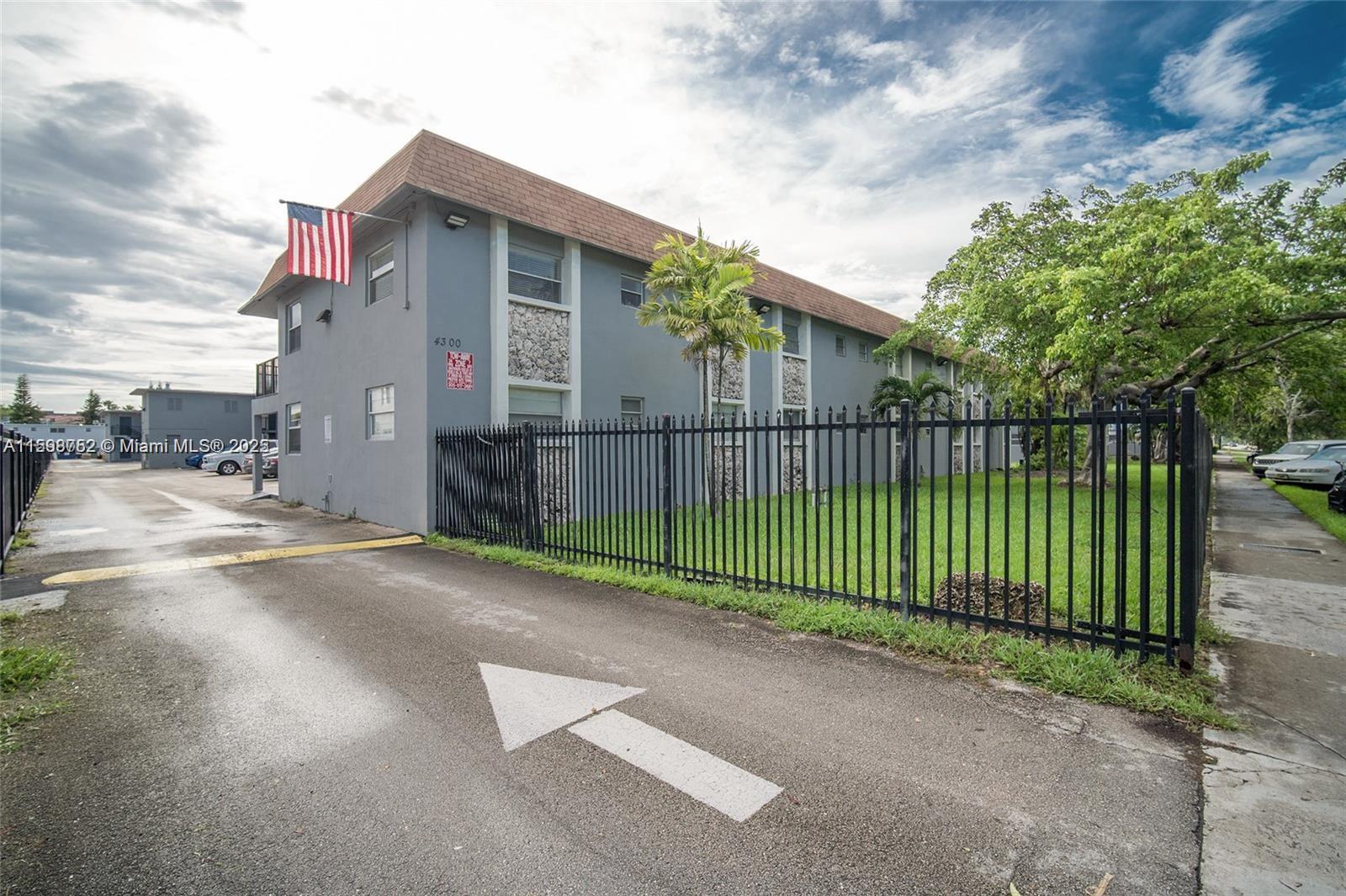 4250 Southwest 67th Avenue, Unit 49 Miami, FL 33155 - Photo 11 of 11 a view of a wrought iron fences in front of house