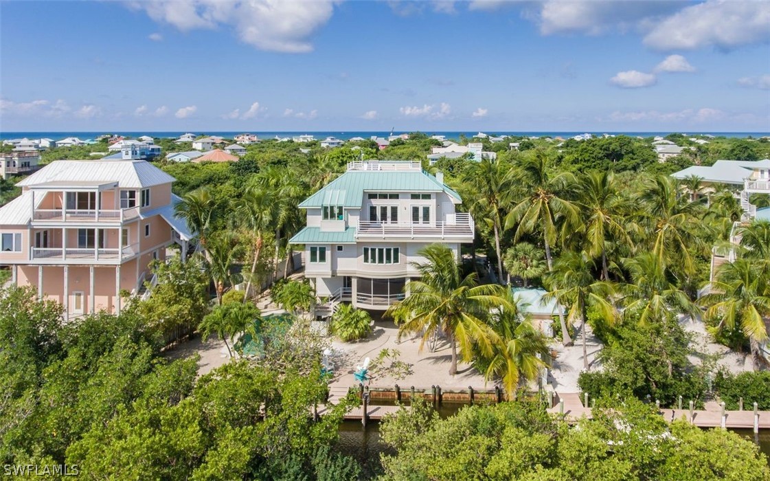 591 Rum Road Captiva, FL 33924 - Photo 2 of 34 a sign on the side of a building