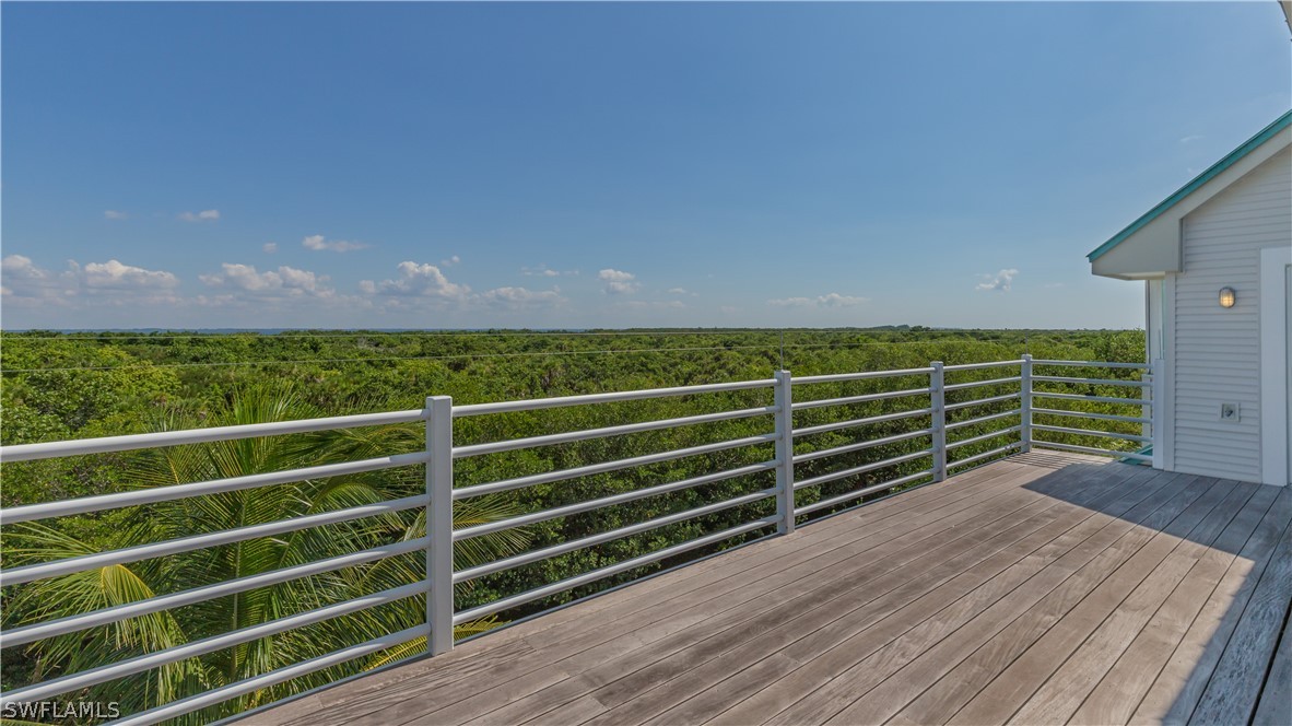 591 Rum Road Captiva, FL 33924 - Photo 28 of 34 a view of a balcony with outdoor space