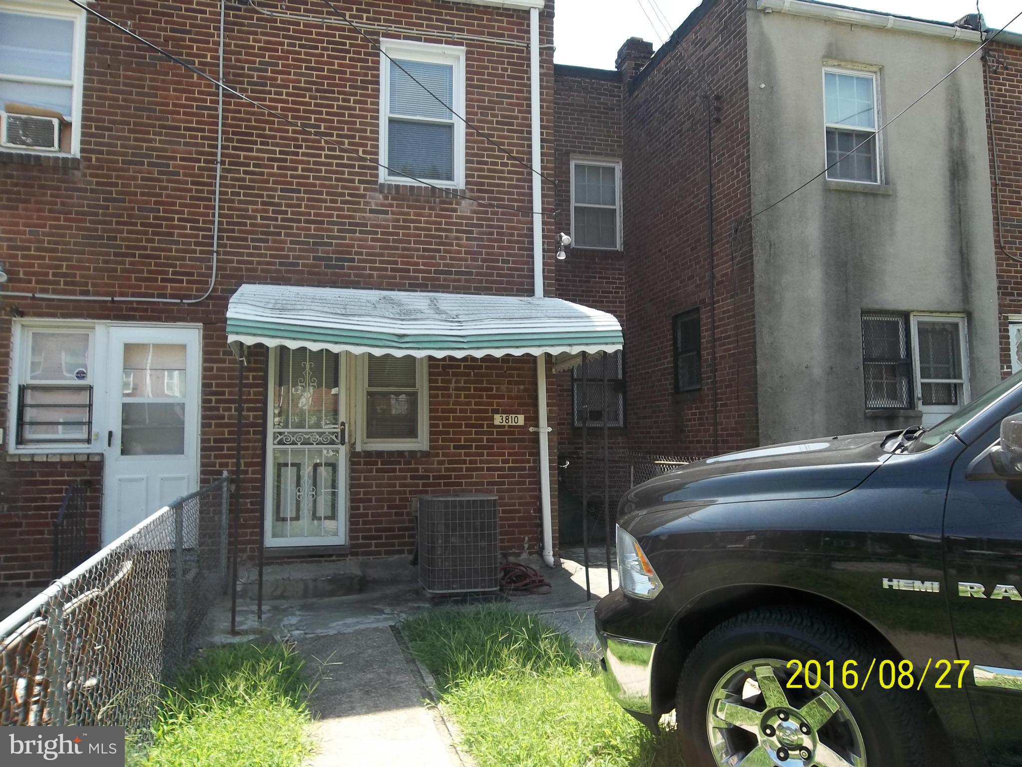 3810 Flowerton Road Baltimore, MD 21229 - Photo 20 of 20 a front view of a house with a garden
