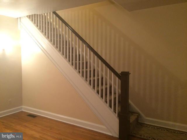 3810 Flowerton Road Baltimore, MD 21229 - Photo 6 of 20 a view of entryway with wooden floor