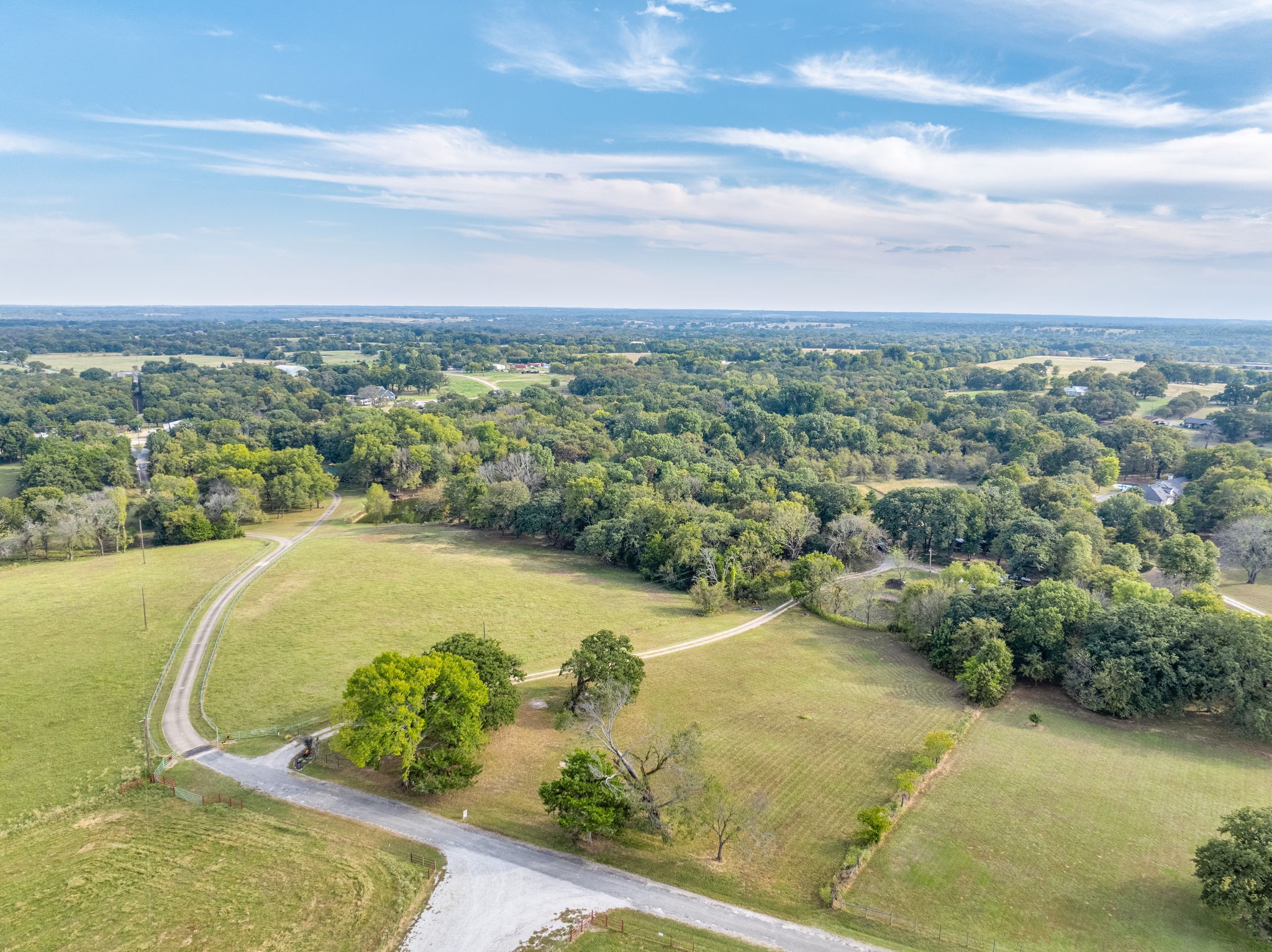312 Magnus Road Denison, TX 75021 - Photo 12 of 50 an aerial view of a residential houses with outdoor space and swimming pool