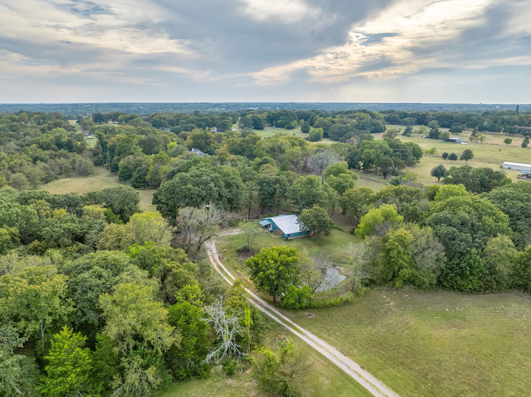 312 Magnus Road Denison, TX 75021 - Photo 23 of 50 a view of a green field