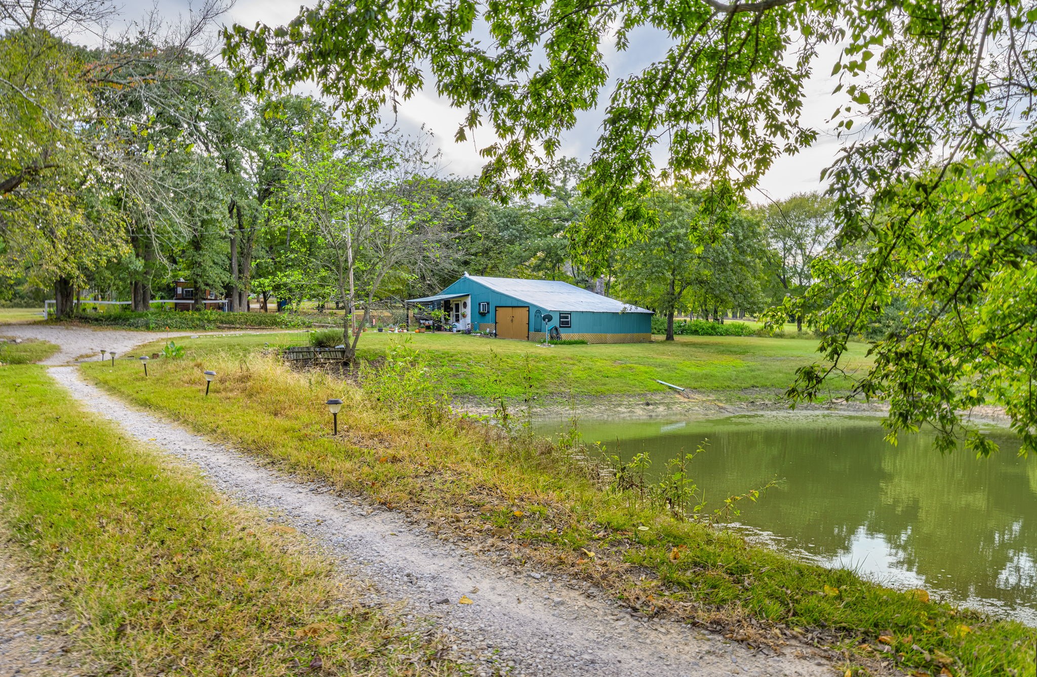 312 Magnus Road Denison, TX 75021 - Photo 27 of 50 a view of a swimming pool with an outdoor space and seating area