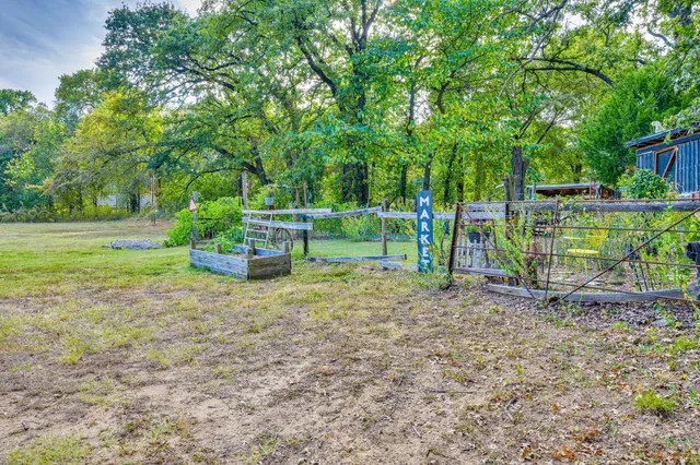 a fire hydrant in the middle of a field