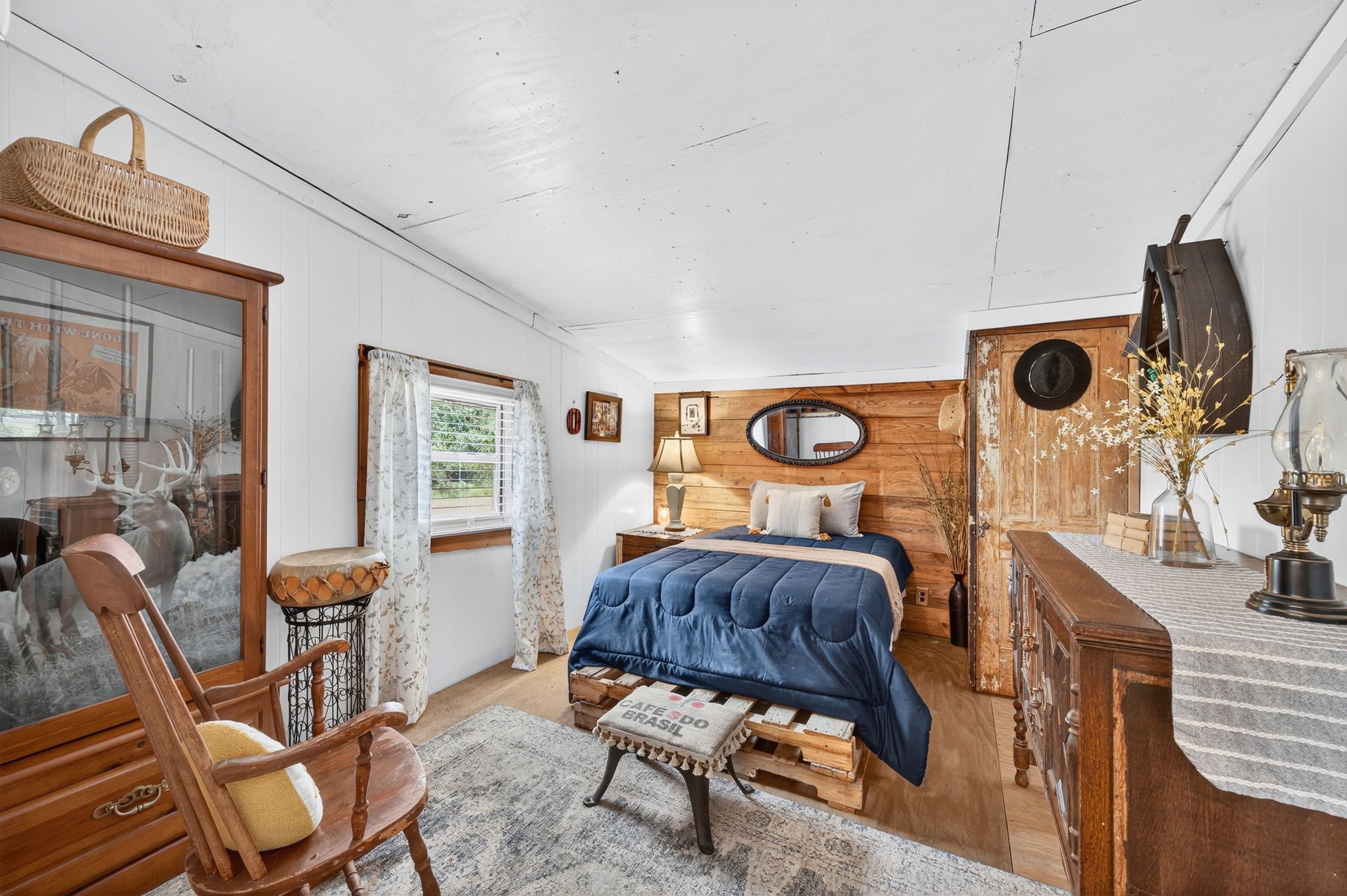 312 Magnus Road Denison, TX 75021 - Photo 41 of 50 a living room with furniture and wooden floor