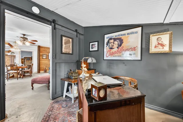 a view of a livingroom with furniture