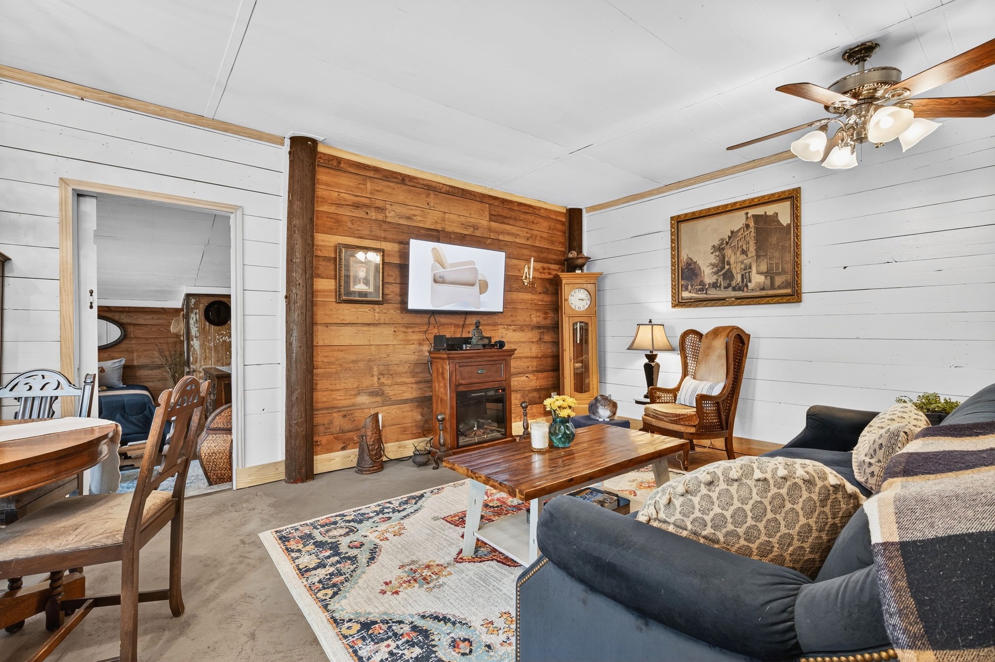 312 Magnus Road Denison, TX 75021 - Photo 46 of 50 a living room with furniture and a table