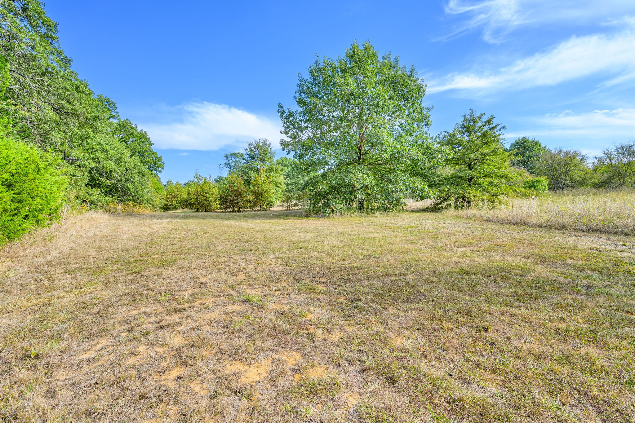 312 Magnus Road Denison, TX 75021 - Photo 7 of 50 a view of a lake view