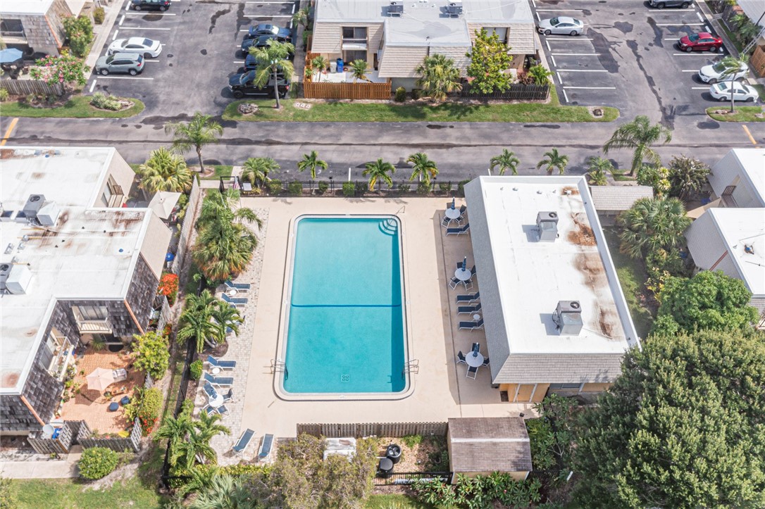1170 6th Avenue, Unit 8B Vero Beach, FL 32960 - Photo 20 of 24 an aerial view of a house with a yard