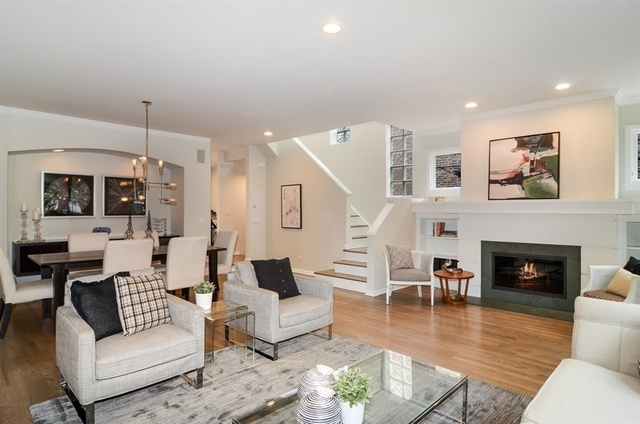 1014 West Grace Street Chicago, IL 60613 - Photo 5 of 24 a living room with furniture and a fireplace