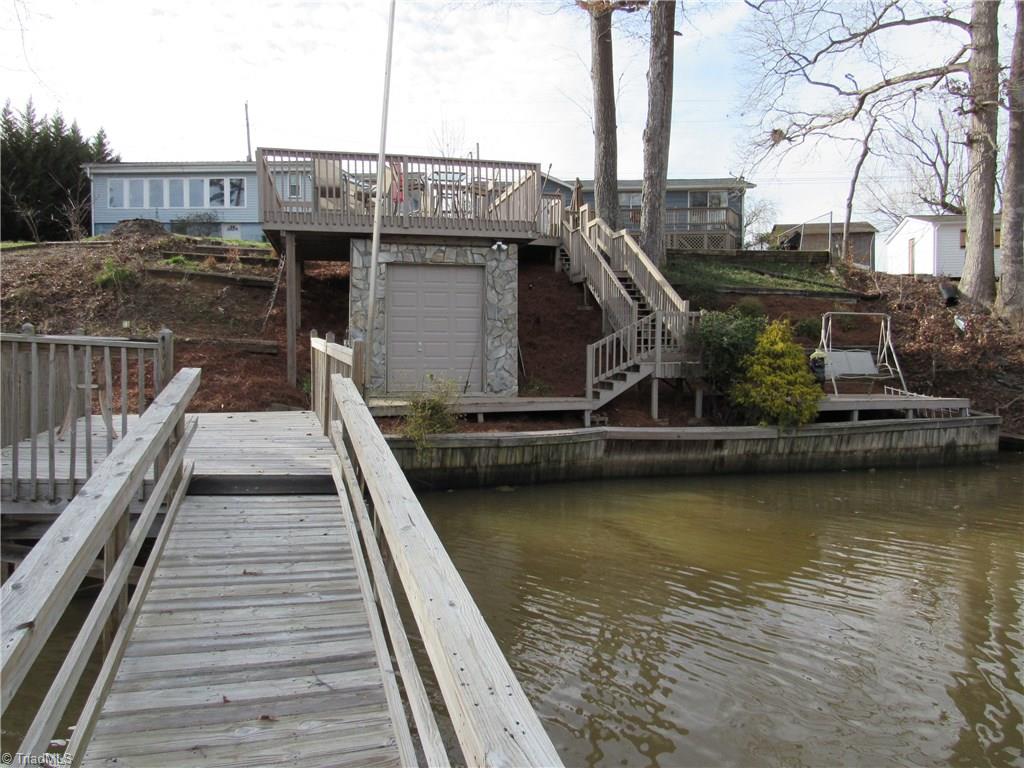 2136 Riverview Rd Extension Lexington, NC 27292 - Photo 16 of 28 Looking back at the house from the floater you will see a storage area for all your lake toys.