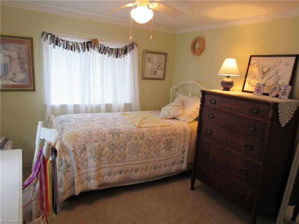 2136 Riverview Rd Extension Lexington, NC 27292 - Photo 26 of 28 2nd bedroom has a twin bed but could have a full bed just as easily.