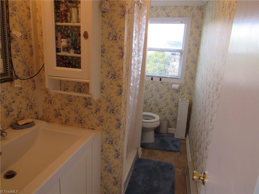 2136 Riverview Rd Extension Lexington, NC 27292 - Photo 28 of 28 Bathroom has an updated vanity and a shower.