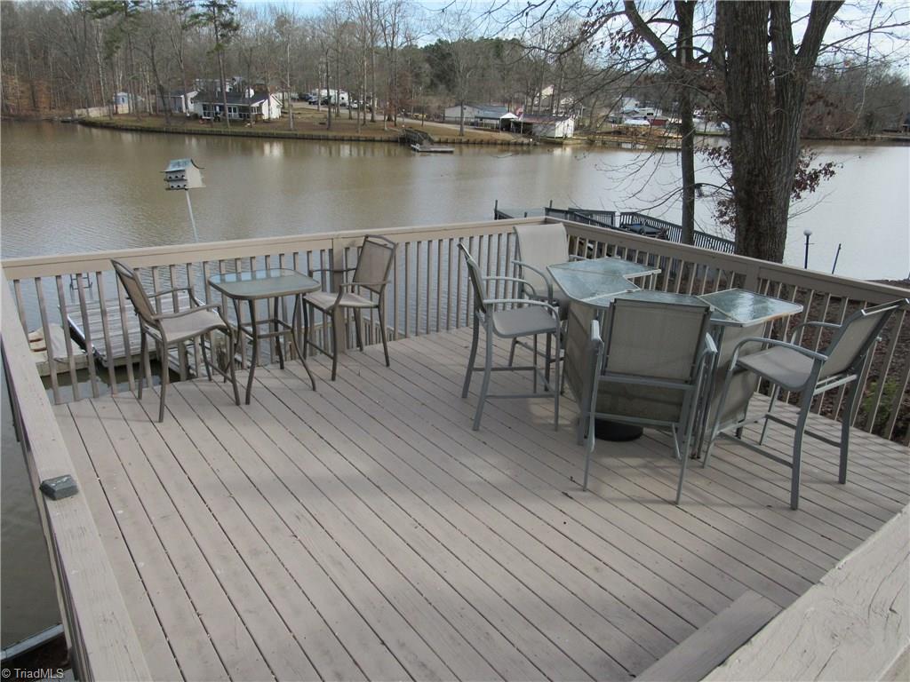 2136 Riverview Rd Extension Lexington, NC 27292 - Photo 9 of 28 This deck with the bar and bistro set is directly lakeside. You could fish from this deck. Great for entertaining with a pitcher of margaritas and a tray of nachos.