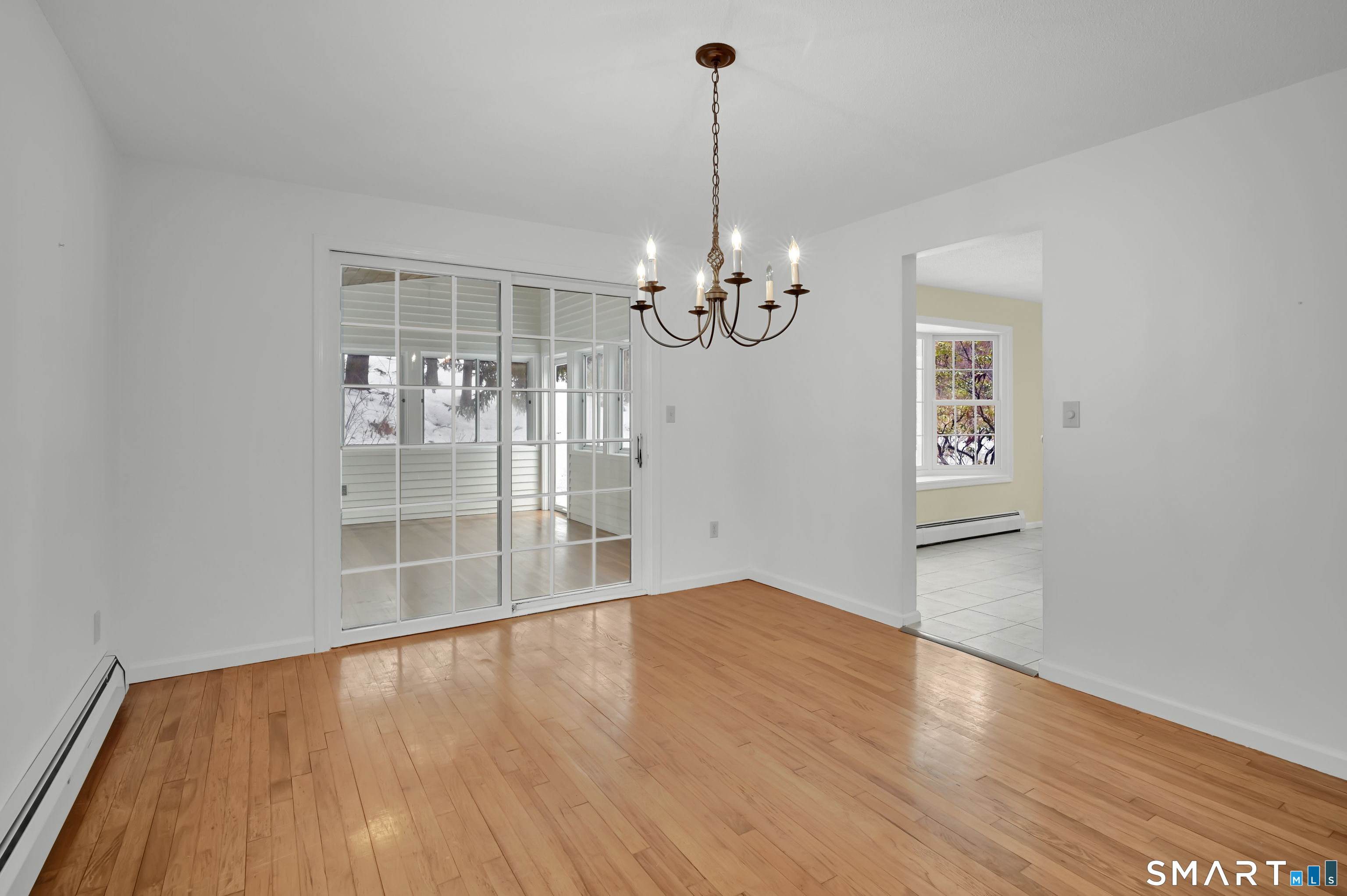 743 Green Hill Road Madison, CT 06443 - Photo 13 of 39 a view of empty room with wooden floor