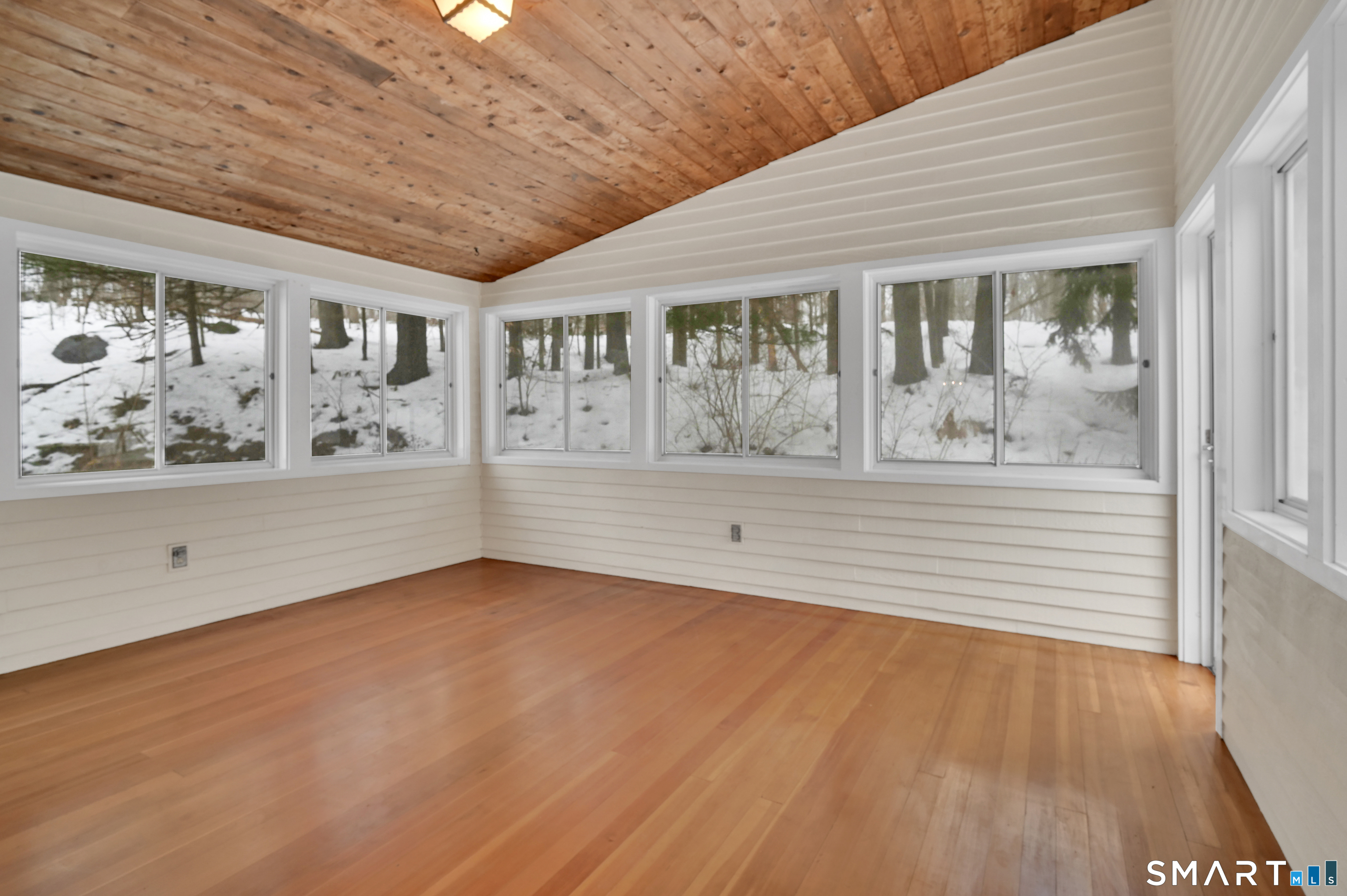 743 Green Hill Road Madison, CT 06443 - Photo 14 of 39 a view of an empty room with a window