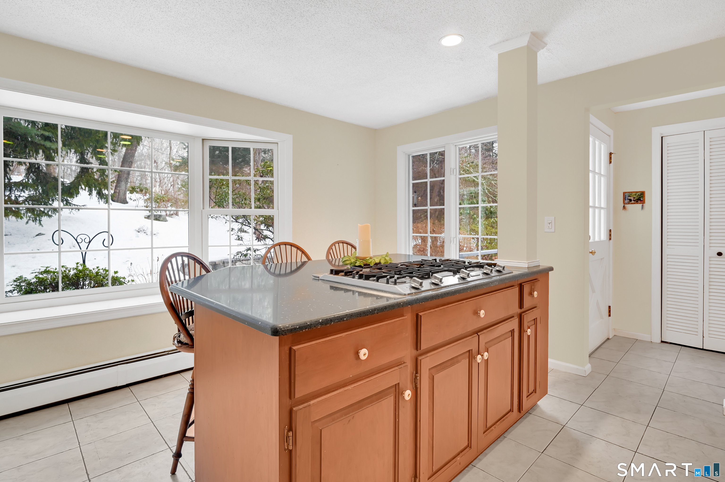 743 Green Hill Road Madison, CT 06443 - Photo 20 of 39 a kitchen with stainless steel appliances granite countertop a stove a sink and a refrigerator