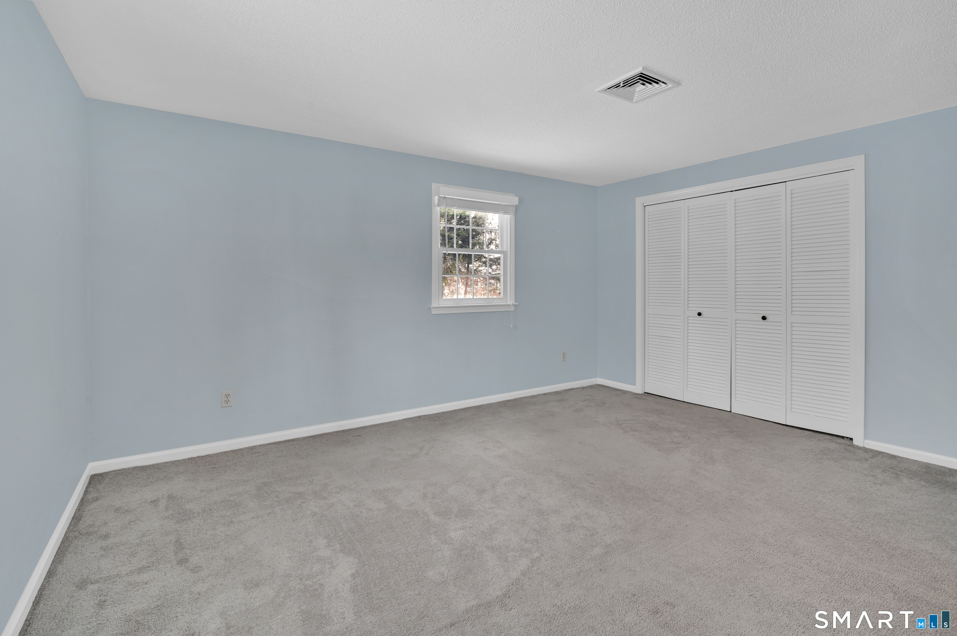 743 Green Hill Road Madison, CT 06443 - Photo 28 of 39 an empty room with windows