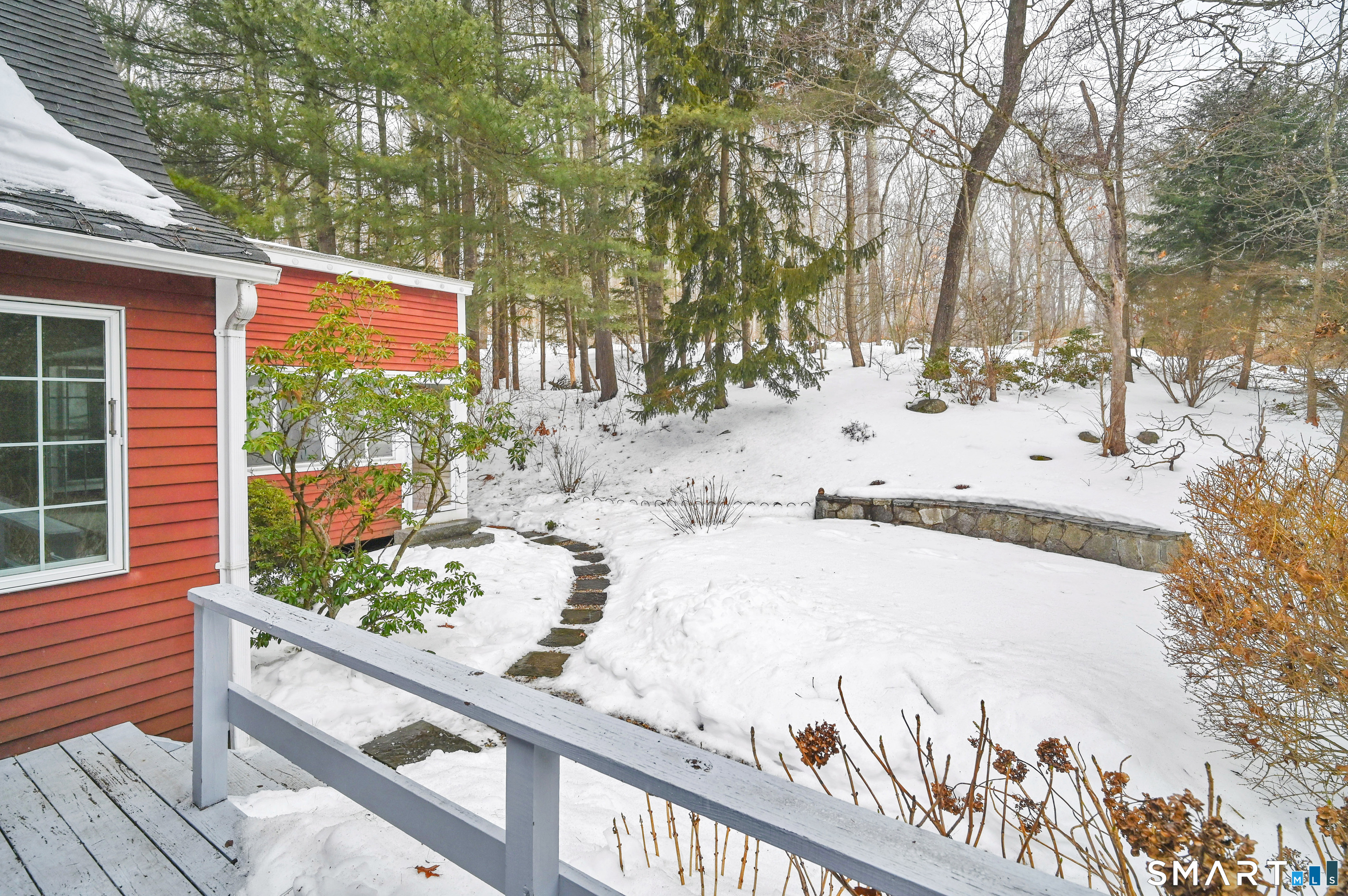 743 Green Hill Road Madison, CT 06443 - Photo 4 of 39 a view of a yard with snow on the road