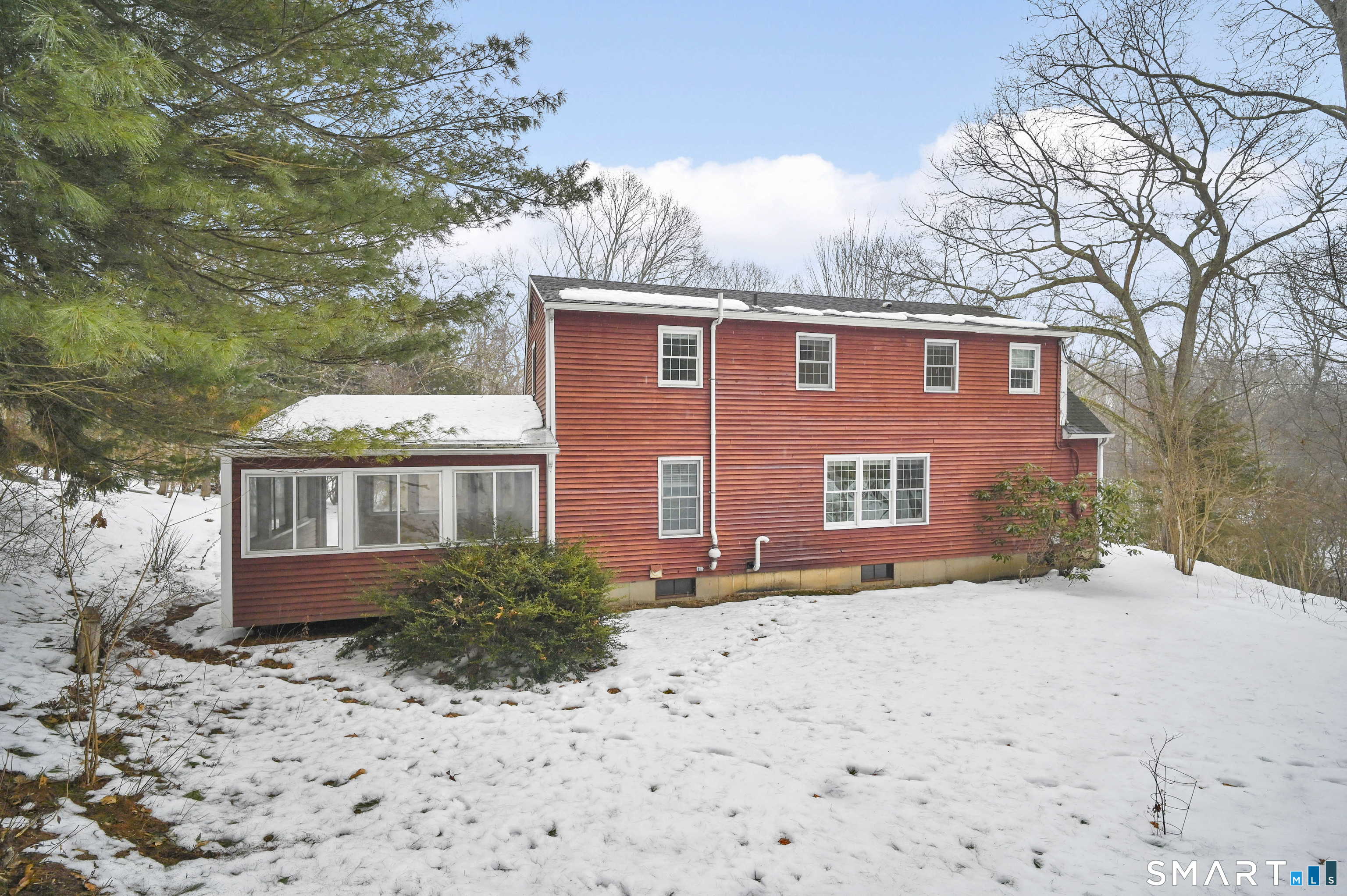 743 Green Hill Road Madison, CT 06443 - Photo 6 of 39 a front view of a house with a yard