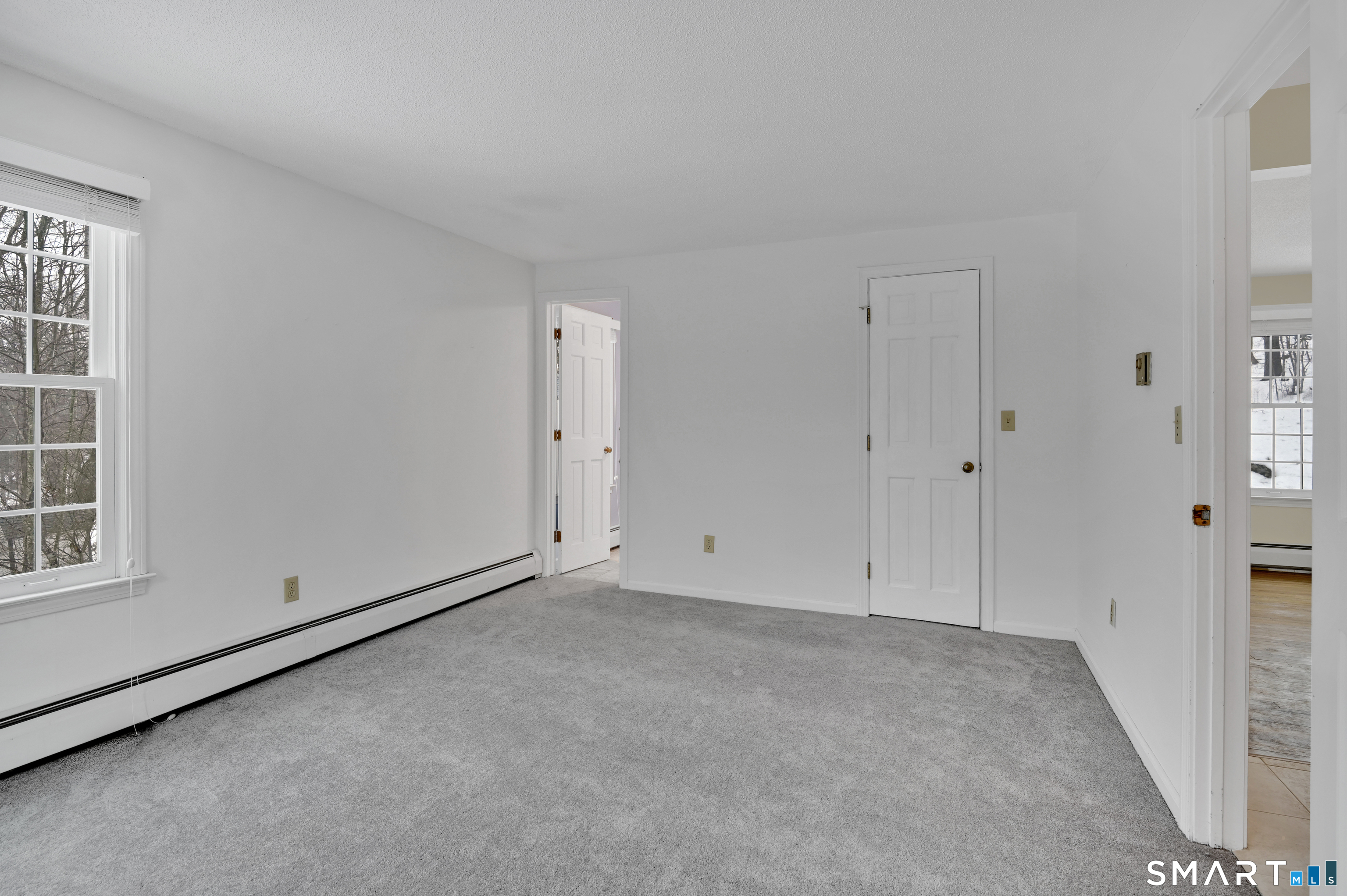 743 Green Hill Road Madison, CT 06443 - Photo 7 of 39 a view of an empty room