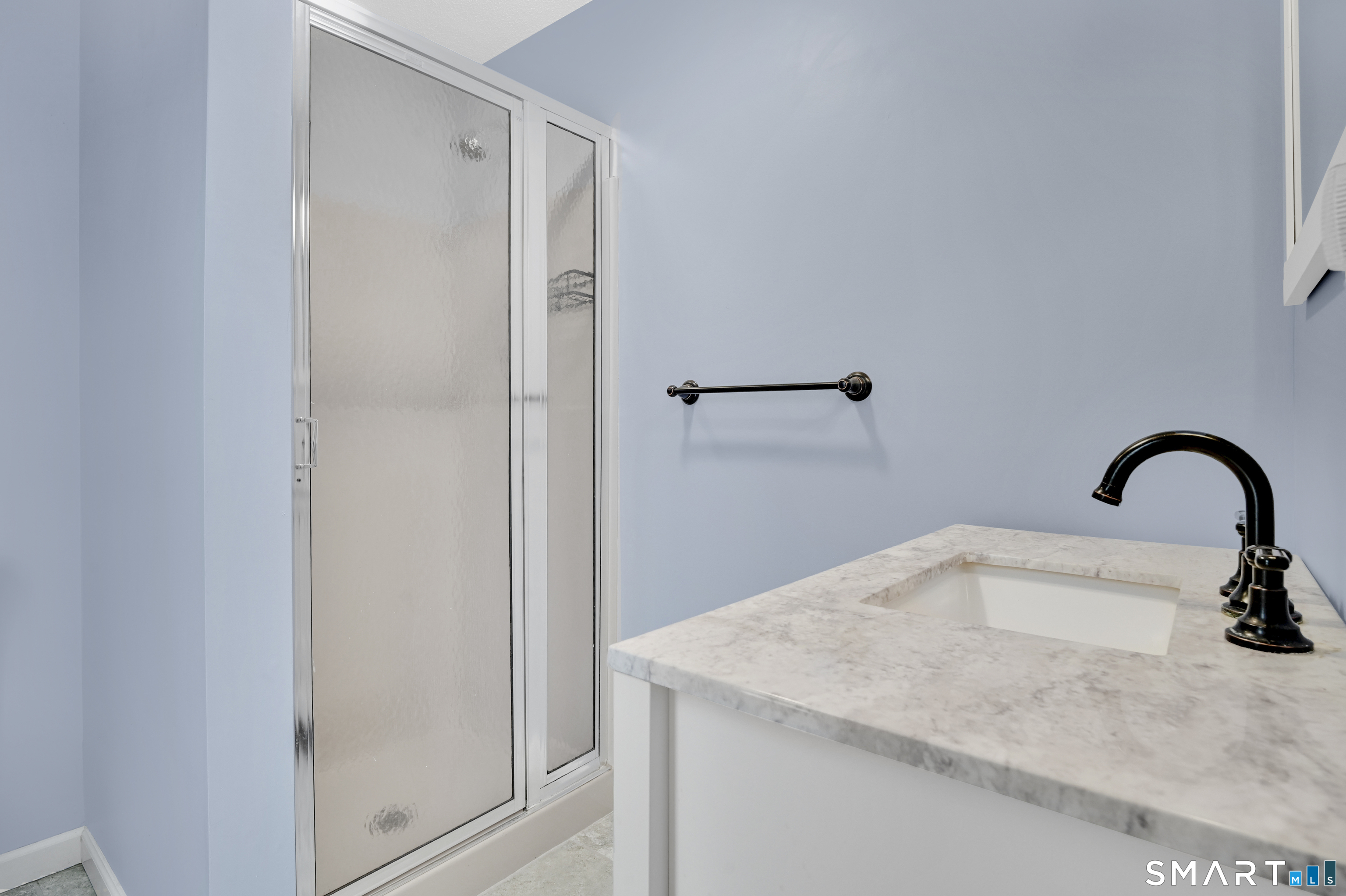 743 Green Hill Road Madison, CT 06443 - Photo 9 of 39 a close view of sink and tap