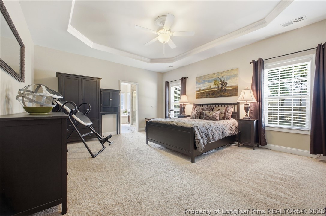 2589 June Johnson Road Raeford, NC 28376 - Photo 16 of 49 a bedroom with a bed furniture and a window