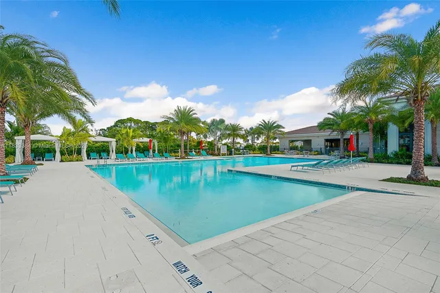 a view of swimming pool from a yard