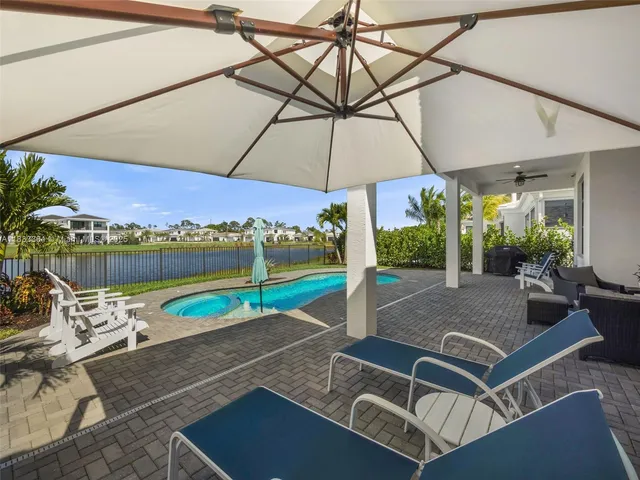 a view of a patio with swimming pool