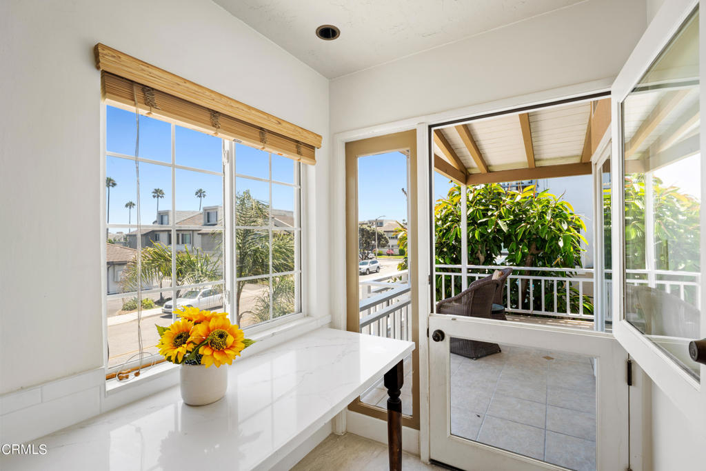 3715 Sunset Lane Oxnard, CA 93035 - Photo 14 of 45 a view of a dining room with a table and chairs