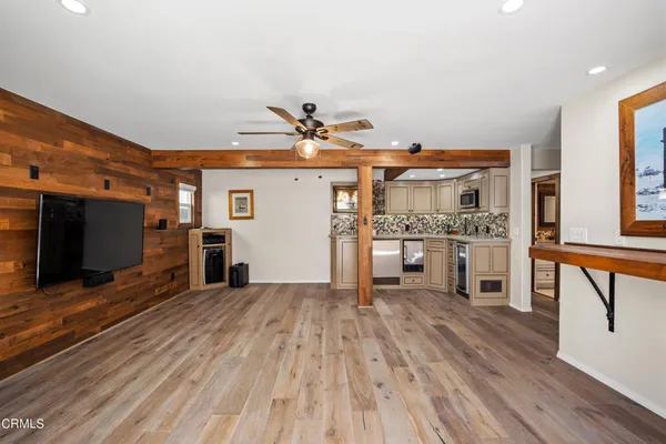 a view of workspace with window and ceiling fan